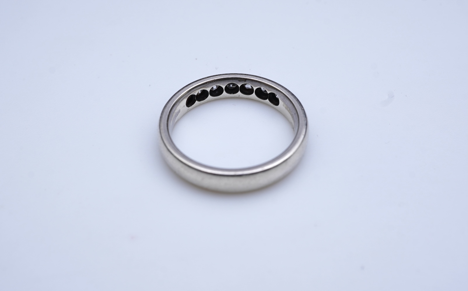 A diamond ring and two gold wedding rings
